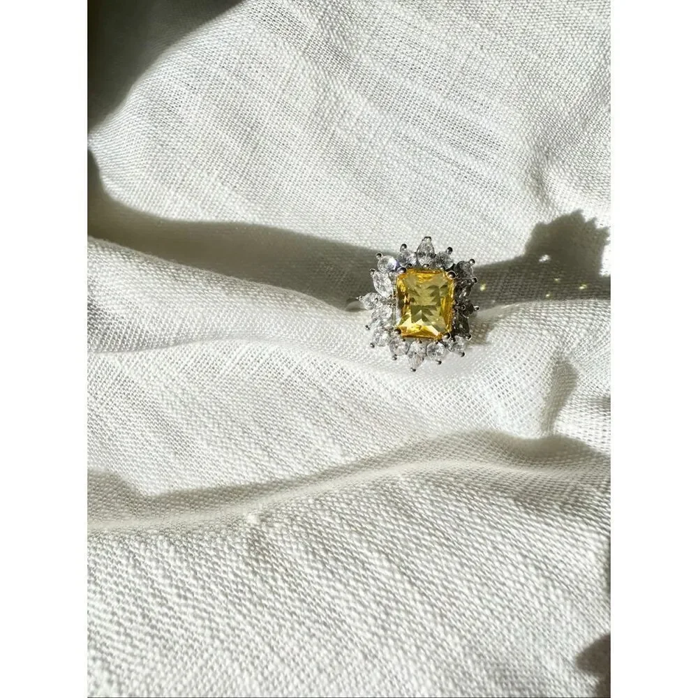 Yellow elongated radiant cut canary cubic zirconia cocktail ring